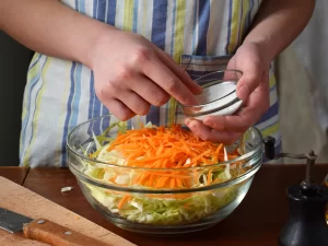 salt cabbage for a sauerkraut recipe